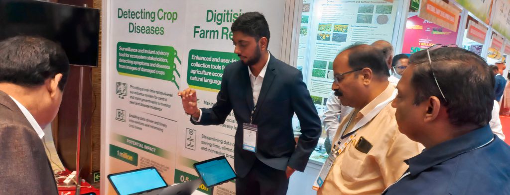 Wadhwani AI team demonstrating AI solution to help farmers and others keep a record of farm activities